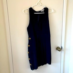 Black romper with buttons down the sides